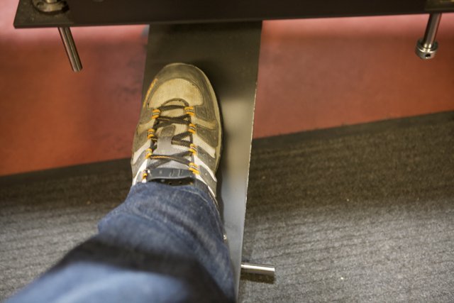Sneaker-Clad Feet on Treadmill