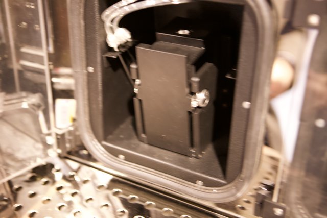 Mysterious Black Object in Metal Box