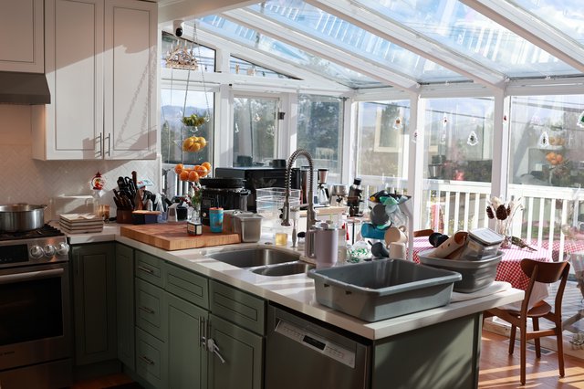 Busy Christmas Kitchen with Sun-Filled Greenhouse View