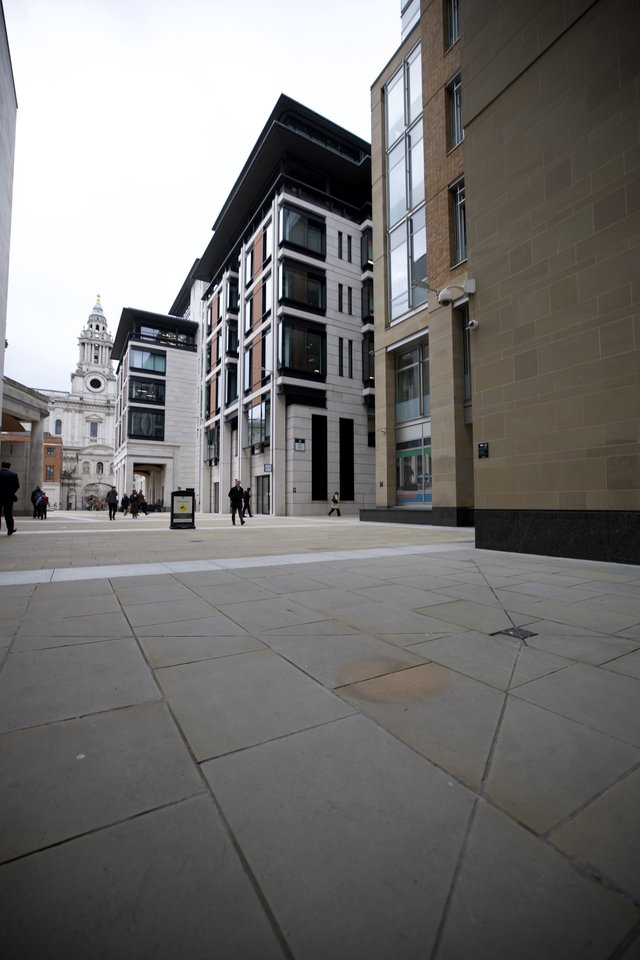 Modern Urban Plaza with Historic Church Tower View