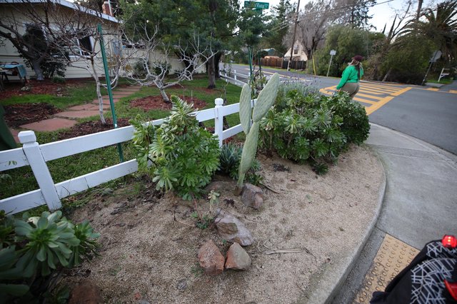 Memorial Garden Corner with White Picket Fence