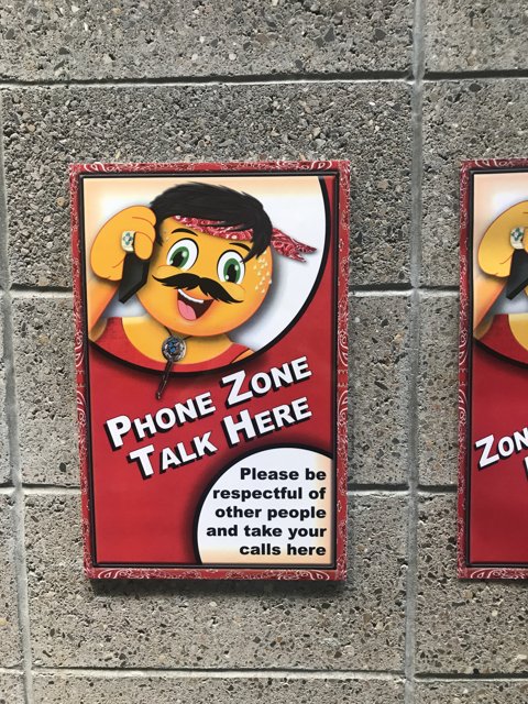 Phone Zone Talk Here Sign at Genoveva Chavez Community Center