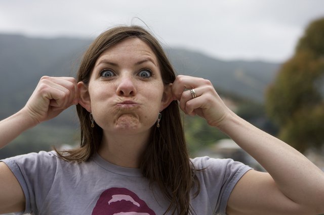 Playful Woman Making Silly Face Outdoors