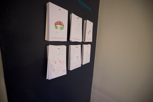 Children's Art Display on Magnetic Chalkboard Wall