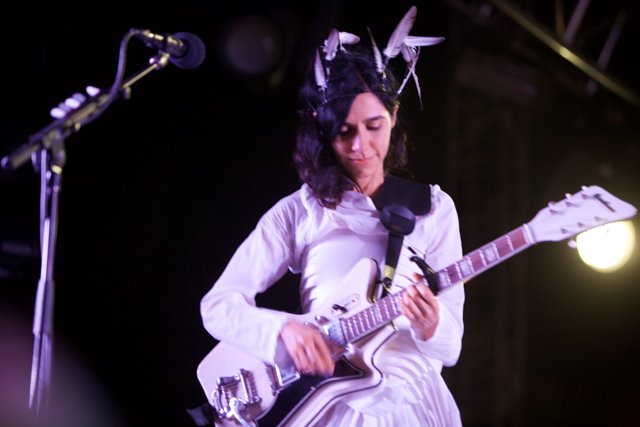 PJ Harvey Rocks Coachella in White Dress and Electric Guitar