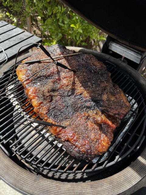 Smoky Spareribs sizzling on the Grill