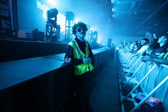 Security Guard Watches the Crowd at Wobbleland 2026