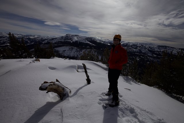 Summit Victory: Snowshoer Atop Sierra Nevada Peak