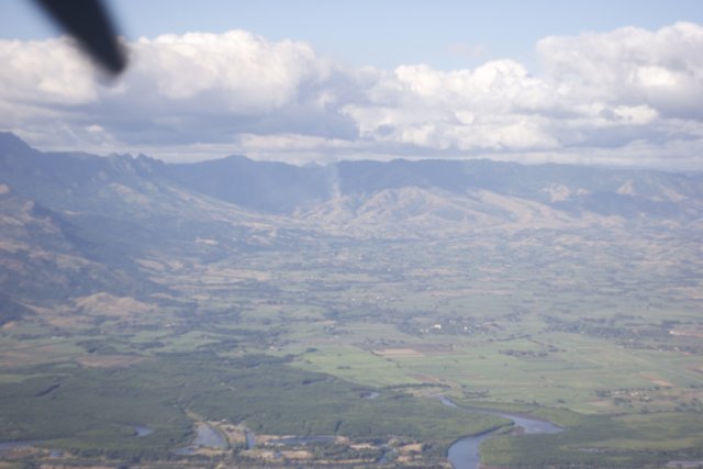 Aerial View of Majestic Mountains and A Vast Valley