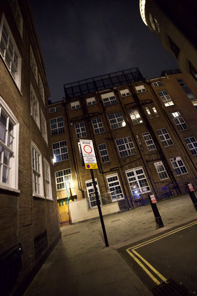 Pedestrian Zone in London Industrial District at Night