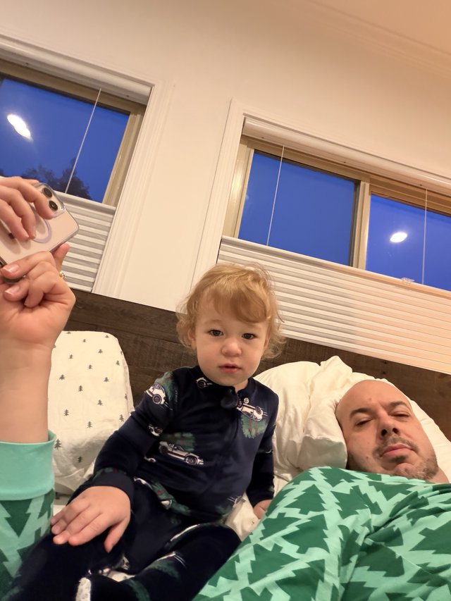 Cozy Family Moment: Father and Toddler in Bedroom
