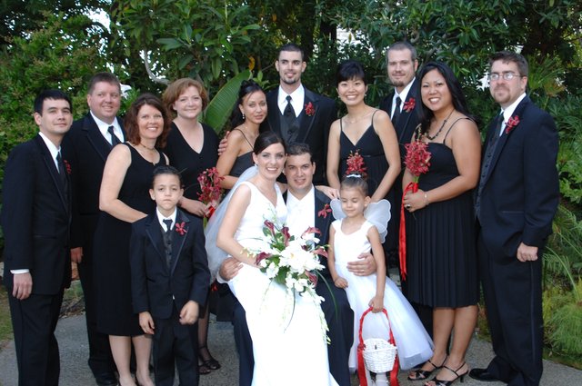 Joyful Wedding Party Celebration in Garden Setting
