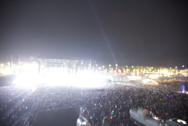 Lights and Flares Illuminate the Night Sky at Coachella Concert