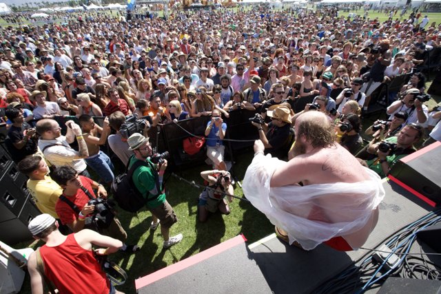 Man in White Shirt Commands Crowd at Coachella