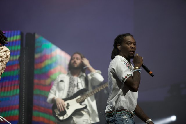Live Performance with Two Men Singing on Stage