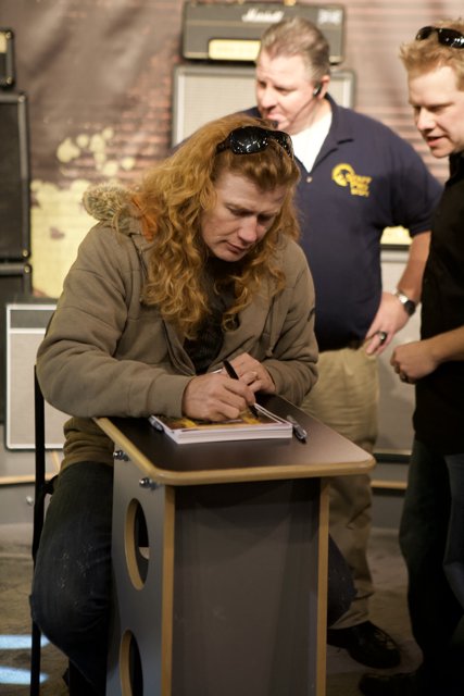 Dave Mustaine Rocks Long Hair and 2 Shoes