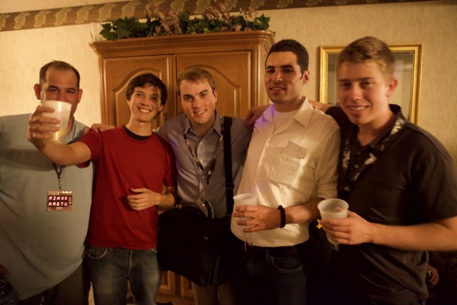Group of Men Enjoying Drinks at the Pub