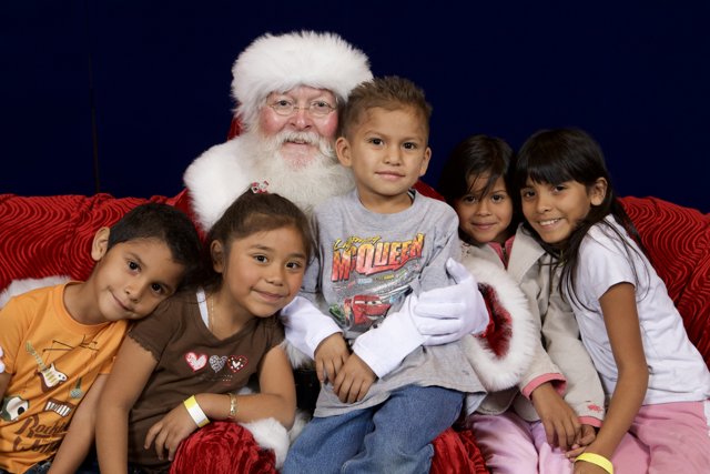 Santa Claus and Children on the Couch