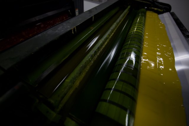 Yellow and Green Paper Printing at the Factory