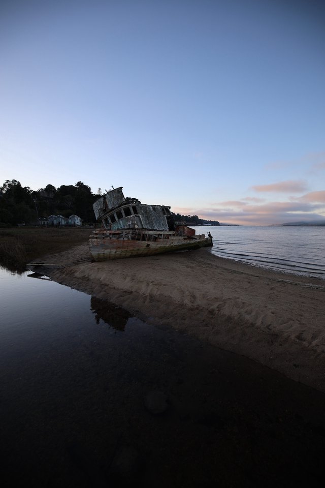 Abandoned Shipwreck at Twilight on California Coast