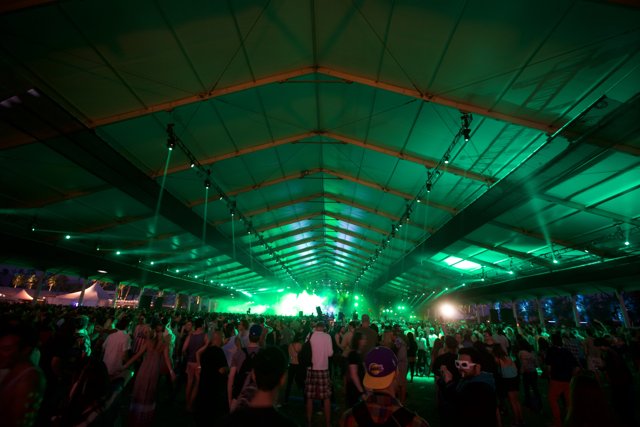 Green-Lit Nightclub Crowd