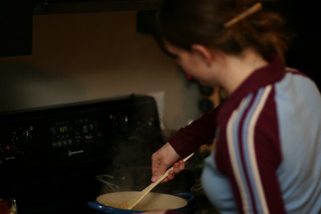 Penelope Stirring a Steaming Pot on the Stove