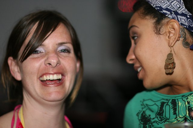 Two Women Share a Joyful Laughing Moment Together