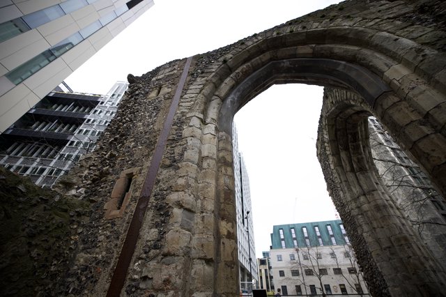 Ancient Roman Arch Amid Modern London Towers