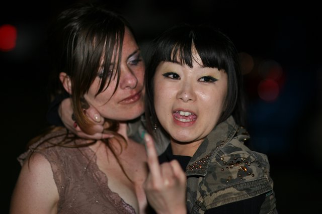 Two Friends Posing at Night Event in 2006