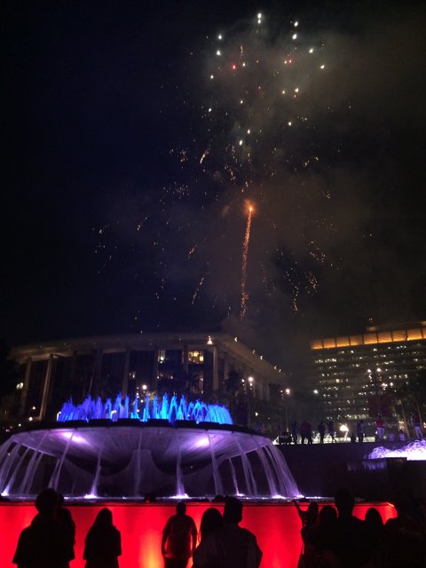 Fireworks illuminate the fountain at Civic Center Mall