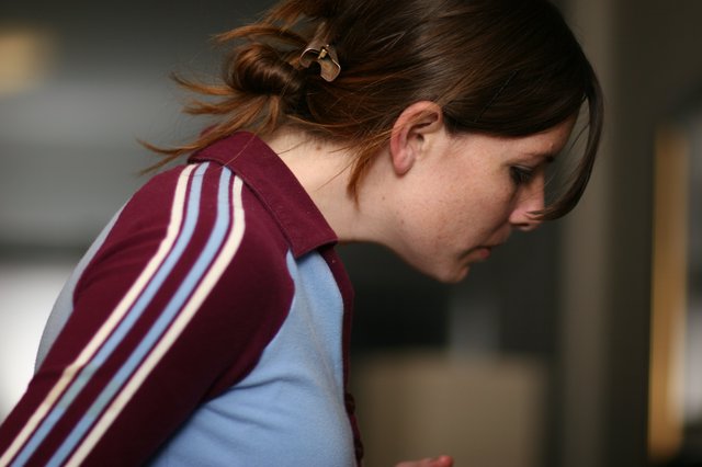 Young Woman Lost in Thought, Profile Close-Up