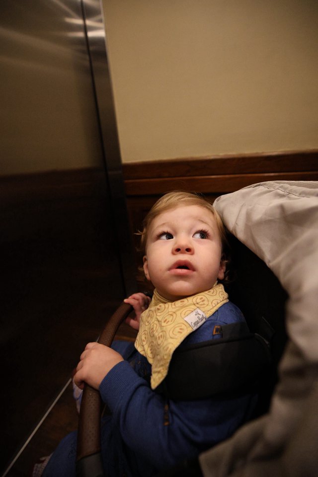 Toddler's Wonder-Filled Gaze from Bedroom Floor