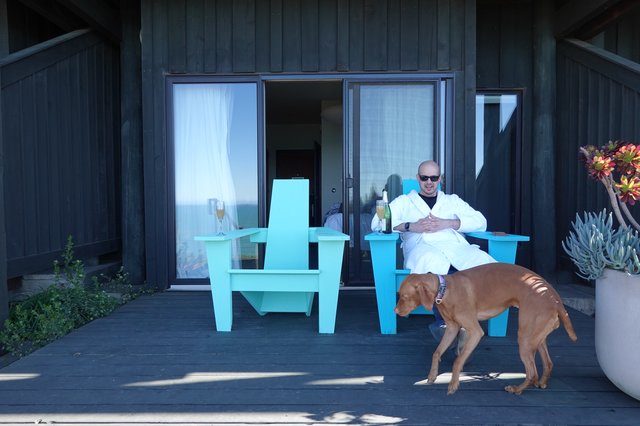 Relaxing with Champagne on Modern Deck
