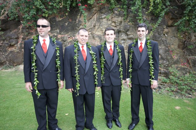Maui Wedding Party with Flower Arrangements and Formal Wear