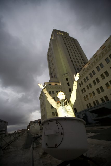 The White Suit Man atop the Metropolis