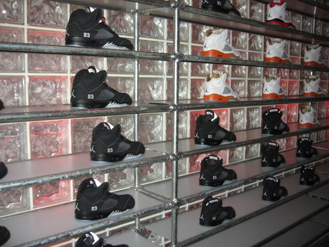13 Shoes on a Shop Shelf