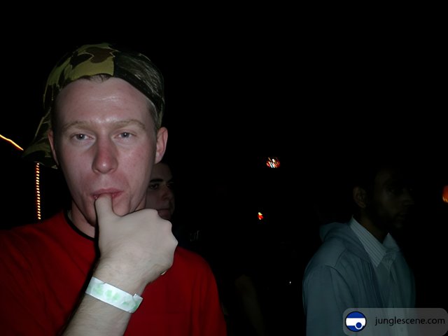 Shh, Don't Tell Caption: Jon Montgomery holds a finger to his lips while out with friends Pete G and another man on a night out in the city in 2003. Notice the stylish bracelets and rings they wear.