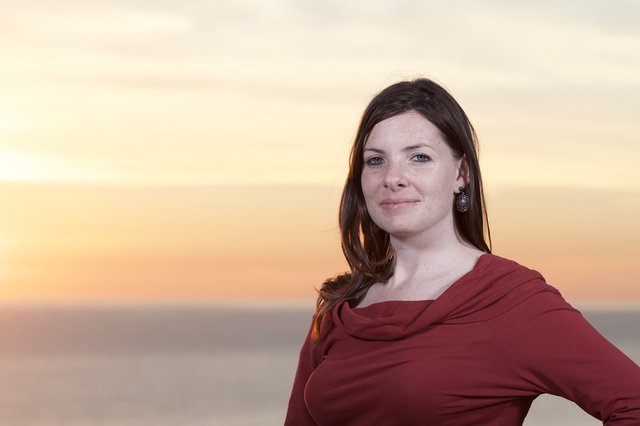 Woman in Red at Golden Hour Seaside