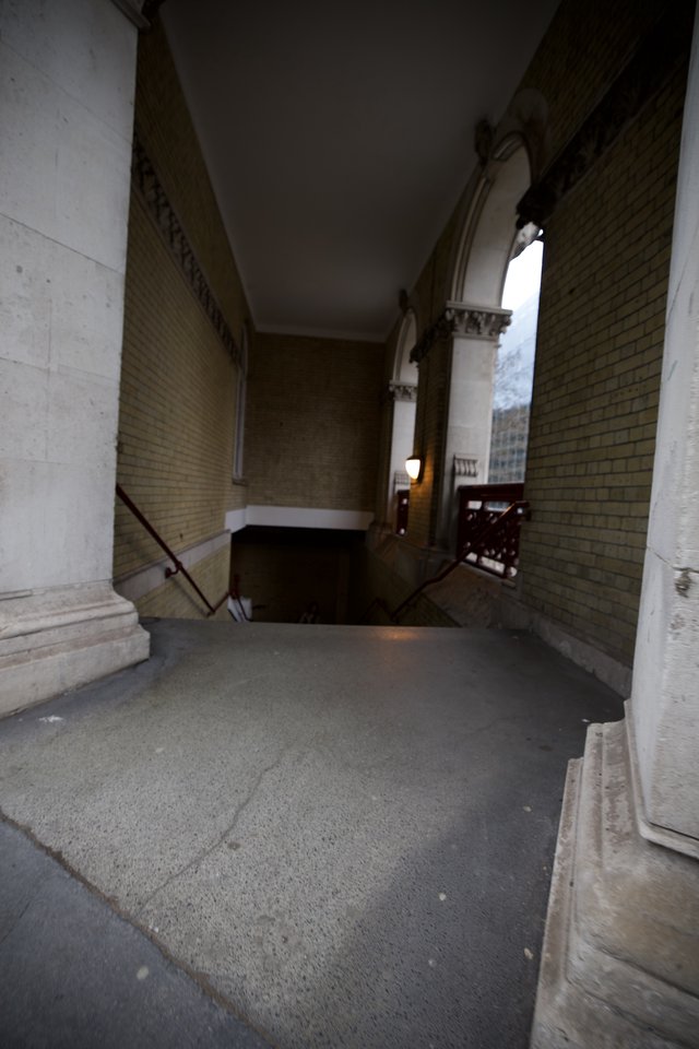 Covered Pedestrian Bridge Between Classical Buildings