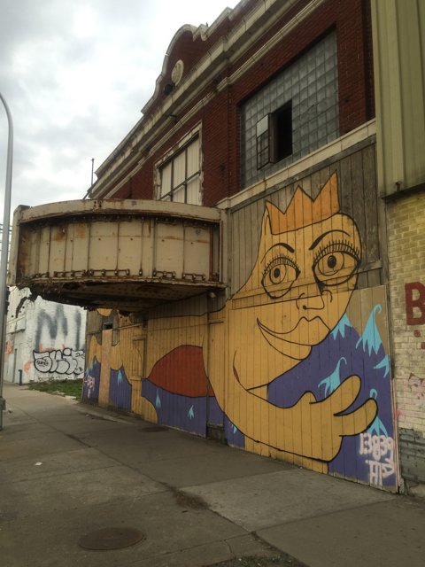 Cartoon Mural Brightens Up City Wall