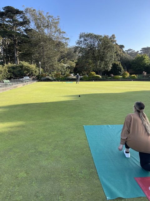 Playing Lawn Bowls on a Sunny Day