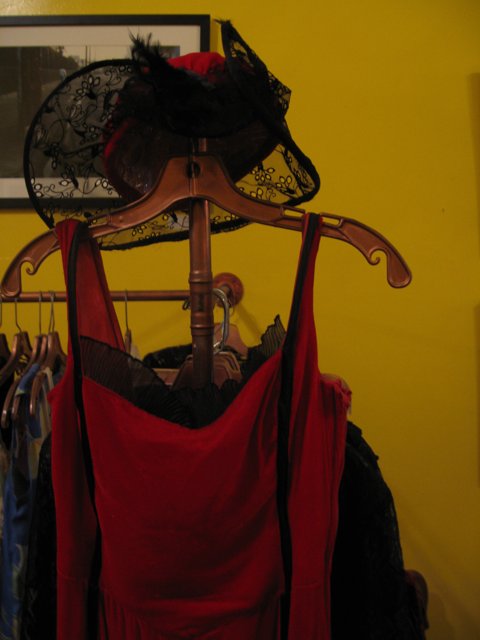 Red Velvet Dress and Hat on Display
