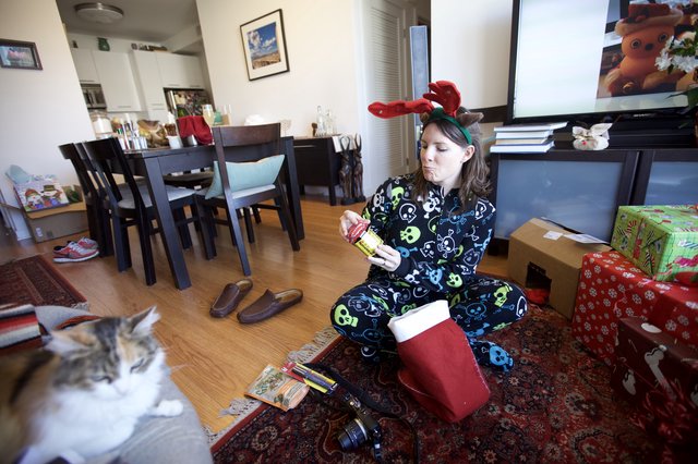 Christmas Morning Stocking Surprises in Reindeer Pajamas
