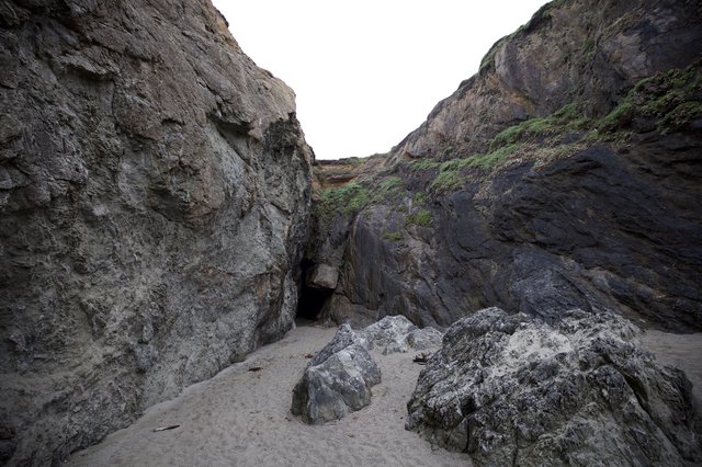 Hidden Sea Cave Nestled Between Dramatic Coastal Cliffs