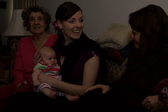 Three Generations of Women Share Tender Moment
