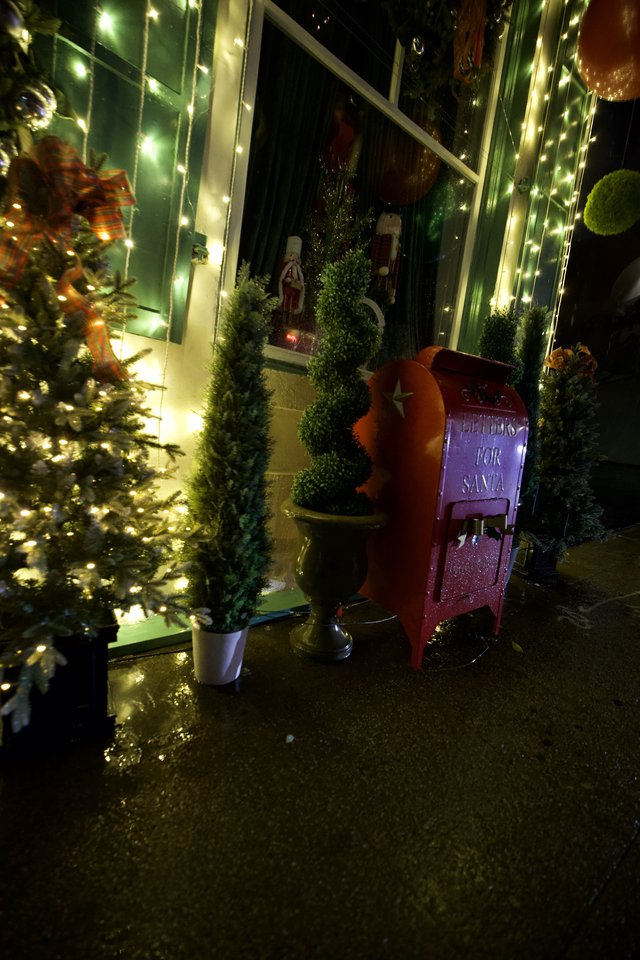 Festive Christmas Display with Santa Mailbox and Twinkling Lights