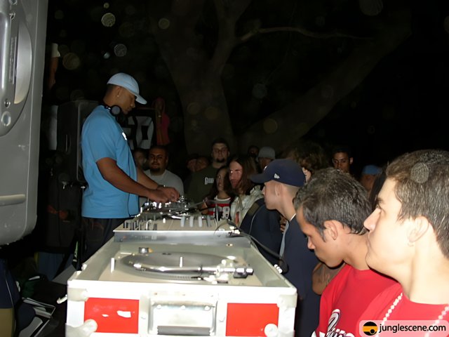 Blue-Hatted DJ Rocks the Nightclub