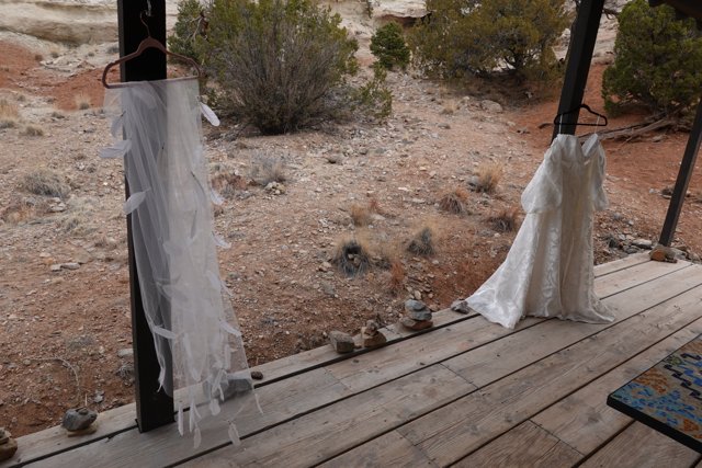 Wedding Dresses on a Wooden Porch