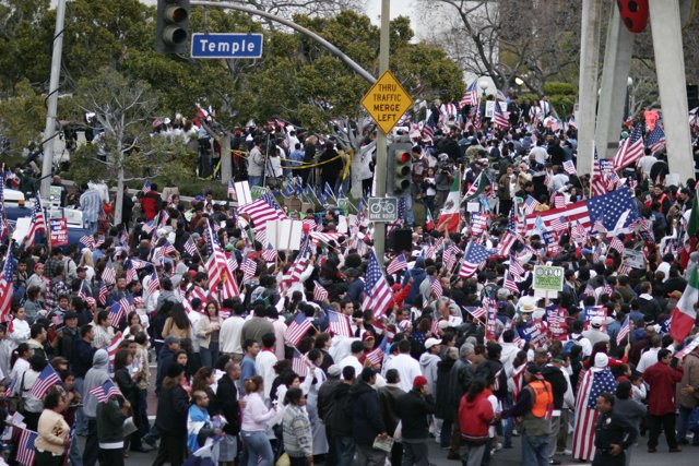 Patriotic Crowd holding American Flags