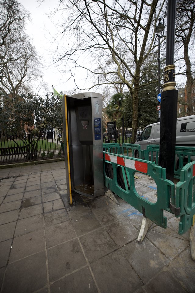 Urban Public Toilet Facility with Construction Barriers